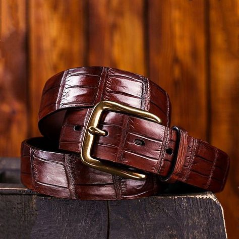 Shiny finish alligator belts, in a dressy 1 1/8" width, have a single belt loop, beautifully feathered edge, with hidden snaps for interchangeable buckles, and a solid brass buckle. In sizes 32-44. Available in A-black, B-brown, or C-cognac. Crocodile Leather Belt, Alligator Belt, Belts For Men, Leather Ideas, Belt For Men, Neil Armstrong, Elevation Design, Crocodile Bags, Leather Crafts