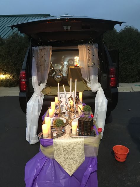 We used our projector to play the movie in the back of the car. Almost all the decorations were from the Dollar Store or Goodwill. Beauty And The Beast Trunk Or Treat Ideas, Beauty And The Beast Trunk Or Treat, Cinderella Trunk Or Treat, Halloween Trunk Or Treat Ideas, Beauty And The Beast Halloween, Wonka Chocolate Factory, Halloween Trunk Or Treat, Cold Play, Halloween Camping