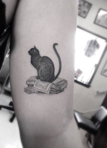 28 Examples of Small Cat Tattoos Small Book Tattoo, Tattoo Quotes For Men, Tattoo Son, Black Cat Tattoos, Tattoo Cat, Cat Tattoo Designs, Latest Tattoos, Book Tattoo, Wolf Tattoos