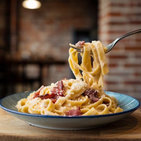 🍝 Craving a creamy, comforting dish? Try this Fettuccine Carbonara with crispy bacon! Simple, rich, and so satisfying! 🥓🍴 **Ingredients:** - 12 oz fettuccine - 4 slices bacon, chopped - 3 large eggs - 1/2 cup grated Parmesan cheese - 1/2 cup heavy cream - 2 cloves garlic, minced - Salt and black pepper to taste - Fresh parsley, chopped (for garnish) **Directions:** 1. Cook the fettuccine in salted boiling water according to the package instructions until al dente. Reserve 1/2 cup ... Fettuccine Carbonara, Comfort Dishes, So Satisfying, Boiling Water, Crispy Bacon, Parmesan Cheese, Grated Parmesan Cheese, Fresh Parsley, Heavy Cream