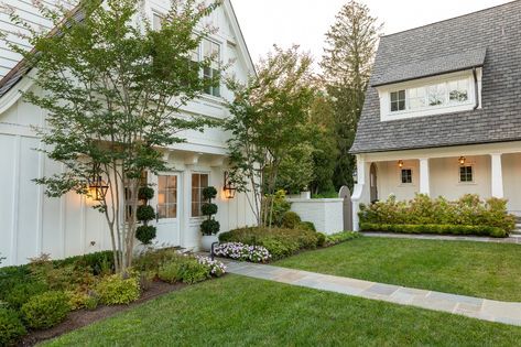 Main Line Landscape Design & Build | Terren Landscapes Traditional Landscape Design, Backyard Hill, Backyard Hill Landscaping, Line Landscape, Hill Landscaping, Landscaping On A Hill, Driveway Landscaping, Colonial Exterior, Farmhouse Landscaping