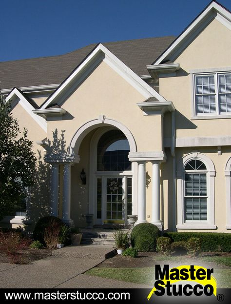 Beige is a stucco color that never seems to go out of style.  It's light, neutral, and accented beautifully by these white architectural details. Exterior Paint Schemes, Stucco Colors, Stucco Texture, Stucco Homes, Iron Gate Design, Stucco Exterior, Starter Home, Garage Ideas, Iron Gate