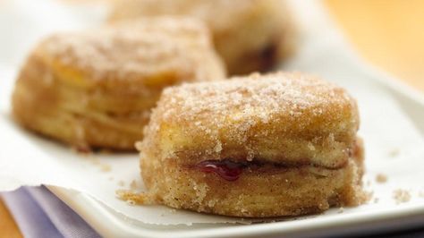 You'll reach star status when you surprise your family with homemade jelly doughnuts!  This easy baked "biscuit to doughnut" version will become a favorite. Pillsbury Biscuits, Jelly Doughnuts, Homemade Jelly, Pillsbury Recipes, Filled Donuts, Raspberry Filling, Doughnut Recipe, Coffee Cakes, Donut Recipes