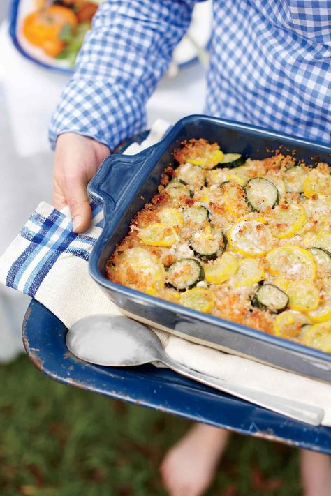 Soft, white breadcrumbs double as a feather-light binder and golden crumb topping for this divine Zucchini, Squash, and Corn Casserole. To make the topping, pulse torn slices of day-old sandwich bread in the food processor. Squash And Corn Casserole, Side Dishes For A Crowd, Dishes For A Crowd, Summer Potluck Recipes, Southern Living Recipes, Christmas Side, Christmas Side Dishes, Zucchini Squash, Baked Casserole