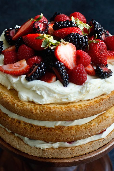 NYT Cooking: Behold! An ode to summer in cake form. In this towering dessert from the food stylist and cookbook author Susan Spungen, crumbly yet tender layers of almond cake are layered with mounds of fresh berries and a rich filling of mascarpone and crème fraîche. It's not difficult to make, but it does take some time, so save this for a lazy Saturday when you've just scored... Berry Layer Cake, Striped Cake, Cake Form, Victoria Sponge Cake, Layer Cake Recipes, Sponge Cake Recipes, Best Chocolate Cake, Almond Cake, Nyt Cooking