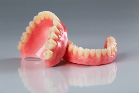 Dentures need attention to stay pearly white and clean, too! Find out how to clean false teeth naturally and how to remove plaque from dentures with ease with our handy, toothy guide. How To Clean Dentures, Denture Repairs, Kedokteran Gigi, Partial Dentures, False Teeth, Dental Laboratory, Family Dentistry, Dental Lab, Best Dentist