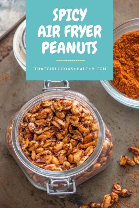 Spicy Air Fryer Peanuts in a jar on a baking tray with a bowl of seasoning in the background. Fried Peanuts Recipe, Spicy Peanuts Recipe, Spiced Nuts Recipe, Seasoned Nuts, Paleo Vegetarian Recipes, Spicy Seasoning, Peanut Recipes, Air Fry Recipes, Spicy Honey