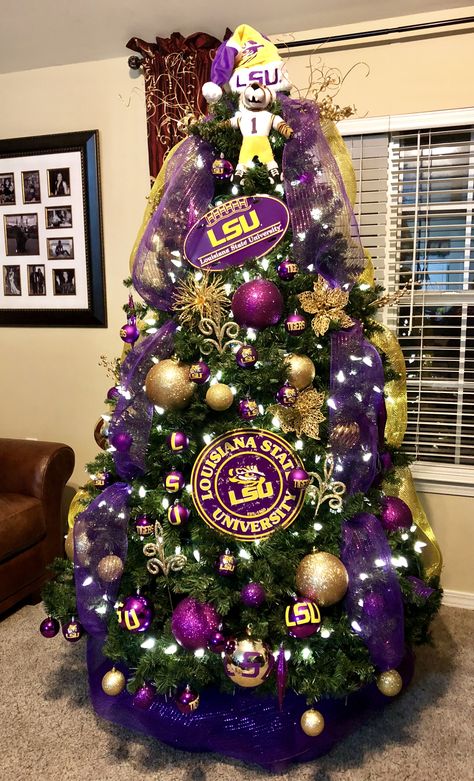 My LSU themed Christmas tree. Saints Christmas Tree Ideas, Lsu Themed Christmas Tree, Lsu Ornaments Christmas Diy, Black Mens Curly Hairstyles, Lsu Decor, Purple And Gold Christmas Tree, Mens Curly Hairstyles, Football Christmas Tree, Steelers Christmas