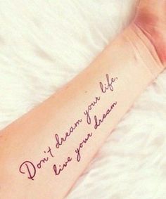 Wear your heart on your sleeve with one of these meaningful quote tattoos Tattoo About Strength, Tattoos Arm Mann, Foot Tattoo Quotes, Arm Quote Tattoos, Inspiring Quote Tattoos, Tattoo Quotes For Men, Good Tattoo Quotes, Inner Forearm Tattoo, Meaningful Tattoo Quotes