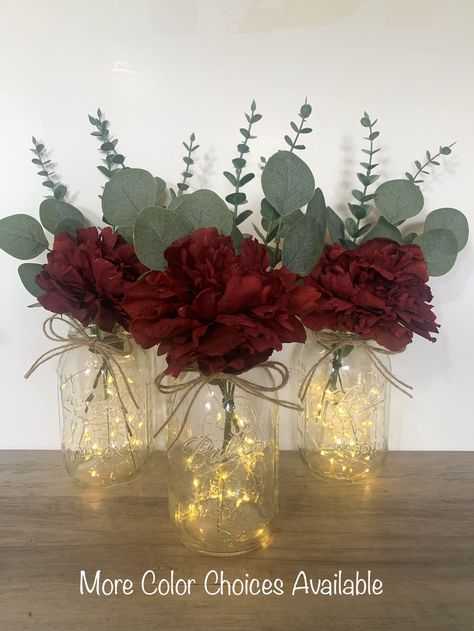 Red And Gray Wedding Centerpieces, Red Floral Table Centerpieces, Simple Floral Centerpieces Mason Jars, Maroon Flower Centerpieces, Burgundy And Green Wedding Centerpieces, Simple Wedding Centerpieces No Flowers, Rustic Burgundy Wedding Centerpieces, Mason Jar Centerpieces For Fall Weddings, Bridal Shower Inspo Decor