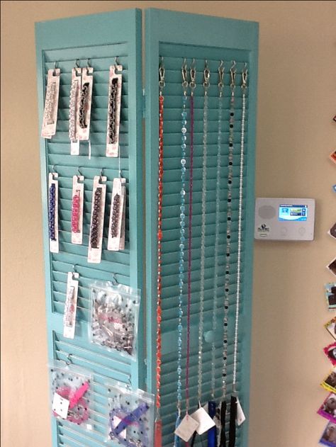 Old bi-fold closet door used to display product in dog grooming salon/boutique Dog Crate Closet, Crate Closet, Pet Store Ideas, Dog Grooming Shop, Vendor Displays, Bifold Closet Doors, Dog Grooming Salons, Dog Salon, Grooming Shop