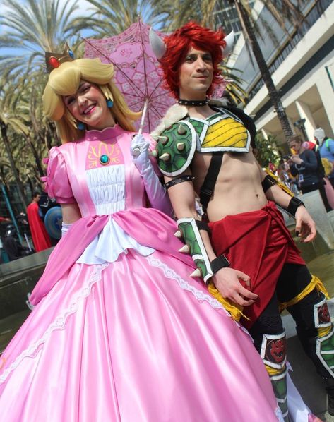 Princess Peach and King Bowser having a grand time. #wondercon #wondercon2023 #cosplay #nintendo #supermario #princesspeach #bowser | Instagram Bowser And Peach Costume, Princess Peach And Bowser Costume, Peach And Bowser Costume, Princess Peach And Bowser, Peach And Bowser, Bowser Cosplay, King Bowser, Mario Halloween Costumes, Bowser Costume