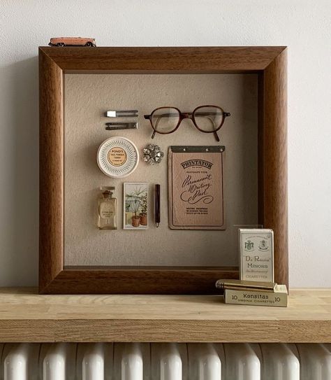 Memento Display Ideas, Memrobilia Display Ideas, Framed Objects Wall Art, Pin Shadow Box Display, Gallery Wall With Shadow Boxes, Shadow Frames Ideas, Sentimental Gallery Wall, Bathroom Shadow Box Ideas, Memory Box Frame Ideas