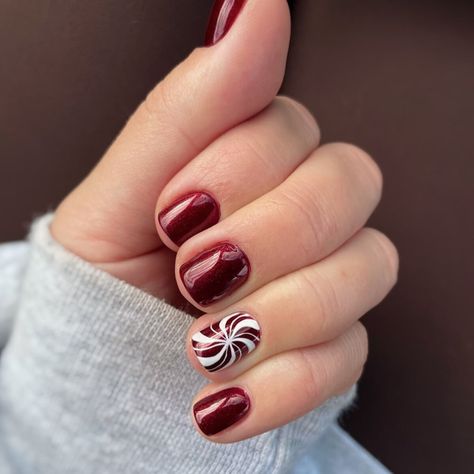 21. Peppermint Swirl Accent on Deep Red Peppermint Swirl Nails, Peppermint Nail Art, Peppermint Nails, Burgundy Nail Designs, Festive Manicure, Festive Nail Designs, Swirl Nail Art, Classic French Manicure, Christmas Nails Easy