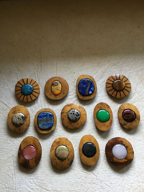 Polished stones set in gourd wood focal pendants, will be necklace pendants and Bolo tie pendants. Gourd Jewelry, Avocado Seed, Wood Resin Jewelry, Necklace Pendants, Gourd Art, Wood Carving Art, Bolo Tie, Wood Resin, Diy Clay