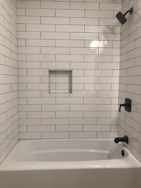 4x16 white subway tile from Home Depot - Charcoal Prism Grout 3x16 Subway Tile Bathroom, 4x16 Subway Tile Bathroom, 4x12 Subway Tile Bathroom, Home Depot Bathroom Tile, Dark Grout, White Subway Tile Bathroom, Home Depot Bathroom, Subway Tile Showers, Subway Tiles Bathroom