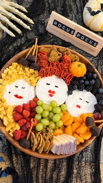 Amber LoMele Matney on Instagram: "HAPPY OCTOBER!!!! My very favorite time of time of the year! 👻🎃🔮 In honor of the Sanderson sisters’ return, I had to jump on the Hocus Pocus charcuterie board bandwagon.🤪 What did you think of the new movie? #ilovehalloween #hocuspocus #sandersonsisters #happyhalloween" Hocus Pocus Candy Board, Hocus Pocus Treat Ideas, Hocus Pocus Snack Board, Sanderson Sisters Cheese Board, Halloween Charcuterie Board Hocus Pocus, Sanderson Sister Charcuterie Board, Sanderson Sisters Charcuterie Board, Hocus Pocus Charcuterie Board, Hocus Locus Cheeseboard