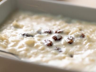 Rum Raisin Rice Pudding, Raisin Rice Pudding, Raisin Rice, How To Make Rum, Nathan Lane, Baked Rice Pudding, Rice Pudding Recipes, Bowl Of Rice, Good Rum