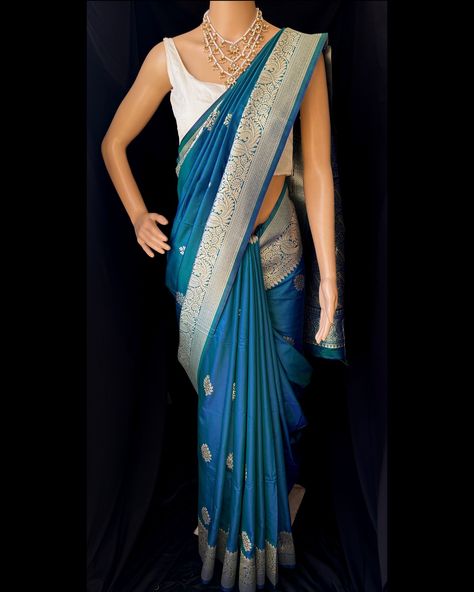 Peacock blue Art silk saree with contrast golden zari border and design all over saree. Comes with running blouse. Find this saree in our website: Www.thejacouture.in > silk sarees> peacock blue art silk saree. #silksarees #peacockbluesaree #artsilk #sareeslove #silk Blue Saree, Art Silk Sarees, Peacock Blue, Blue Art, Silk Saree, Silk Sarees, Saree, Silk, Running