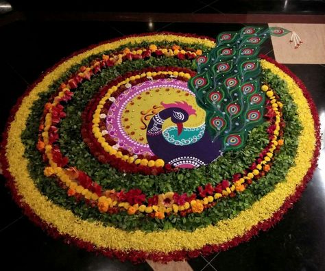 Peacock Flower Rangoli, Onam Decoration Ideas, Floral Rangoli Designs Flower, Agrasen Jayanti, Onam Decoration, Religion Aesthetic, Saraswati Pooja, Rangoli Painting, Diwali Story