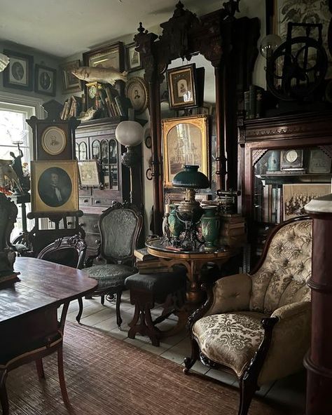 Geoff Howell on Instagram: "There’s something about deeply dense decor that I adore…especially in this room that features 19th century photography, and in black and white, swipe to see, with the exception of a few books, this could pass for a period interior…of some crazy person…whose love of the decorative arts apparently knew no bounds. Of course, there are self imposed guidelines here as there are everywhere else in my house…there is a teal/soft green/green color palette, and the “stuff” is a 19th Century House Interior, 19th Century Interior, 19th Century House, Crazy Person, Green Color Palette, Green Colour Palette, Antique Lighting, Wood Stove, My House