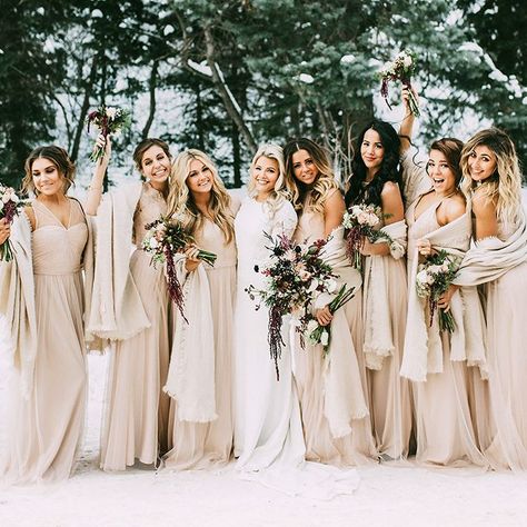 Brides.com: . Dancing with the Stars' Lindsay Arnold, Emma Slater, Jenna Johnson, and Brittany Cherry. Just imagine the dance floor at this reception! DWTS pro, Witney Carson, called upon her twirling co-stars to serve as bridesmaids at her New Year's Day wedding. Lindsay Arnold, Emma Slater, Jenna Johnson, and Brittany Cherry all donned matching pale pink Amsale gowns and wintery wraps for the occasion. Wedding Color Schemes Winter, Winter Wedding Bridesmaids, Winter Wedding Color Palette, Winter Bridesmaids, Winter Wedding Photos, Winter Bridesmaid Dresses, Champagne Bridesmaid Dresses, Champagne Bridesmaid, Winter Wedding Colors