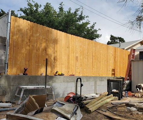 Concrete Block Fence Ideas, Wood Fence On Top Of Cinder Block Wall, Cinder Block Privacy Fence, Cement Block Fence Ideas, Cinder Block Privacy Wall, Cinderblock Fence Ideas, Cement Block Fence, Cinder Block Fence With Wood, Block Fence Ideas