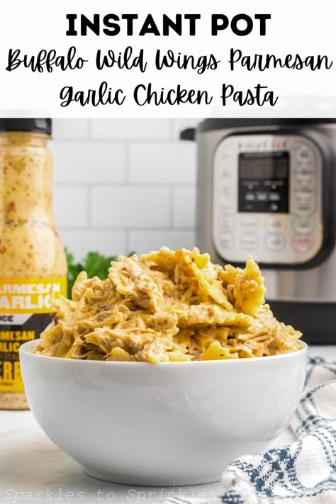 Instant Pot Buffalo Wild Wings Parmesan Garlic Chicken Pasta is a quick and easy way to enjoy a creamy homemade pasta dish that everyone will love that combines Buffalo Wild Wings Parmesan Garlic Sauce, cream cheese, chicken, parmesan cheese, and pasta that is ready in no time. Garlic Parm Chicken Instant Pot, Buffalo Wild Wings Garlic Parmesan Chicken Instant Pot, Buffalo Wild Wing Parmesan Garlic Chicken Pasta Crock Pot, Instant Pot Parmesan Garlic Chicken Pasta- Buffalo Wild Wings Sauce, Instant Pot Buffalo Wild Wings Pasta, Instant Pot Chicken Parmesan Pasta, Buffalo Wild Wings Garlic Parmesan Pasta Instant Pot, Buffalo Wild Wings Parmesan Garlic Pasta, Buffalo Wild Wings Pasta