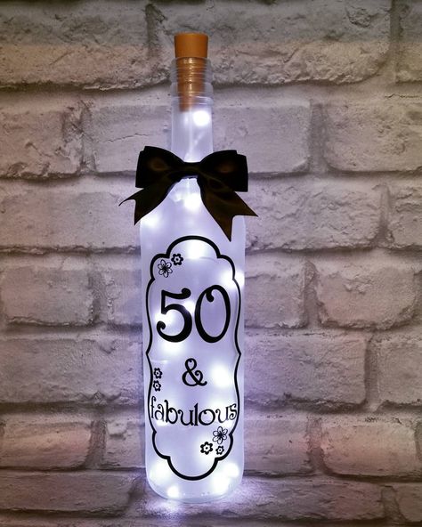 🎉50 & fabulous, light up wine bottle for a 50th birthday gift #winebottle #winebottleart #50thbirthday #gifts #nightlight #upcycle… Bottle Etching, Upcycle Bottles, Birthday Candy Bouquet, Celebrate Birthday, Empty Wine Bottles, Bottle Craft, Wine Bottle Art, Wine Bottle Diy Crafts, Painted Wine Bottles