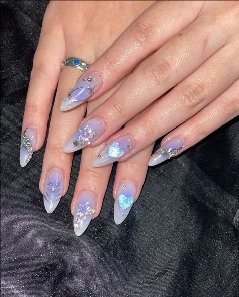 Shinny Nails Ideas, Purple Japanese Nails, Dreamy Blue Nails, Blue Irridescent Nails Acrylic, Light Blue Nails With Charms, Purple Aurora Nails, Korean Purple Nails, Douyin Nails Purple, Purple Blush Nails