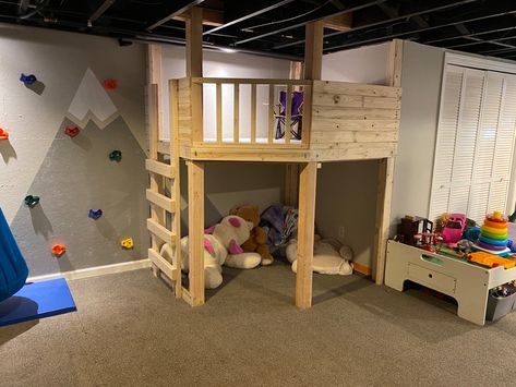 Basement Play Corner, Unfinished Basement Toy Room, Playroom Fort Loft, Indoor Loft Playhouse, Indoor Playground Small Space, Diy Indoor Treehouse, Under The Stairs Play Area, Indoor Play Fort, Indoor Jungle Gym Diy