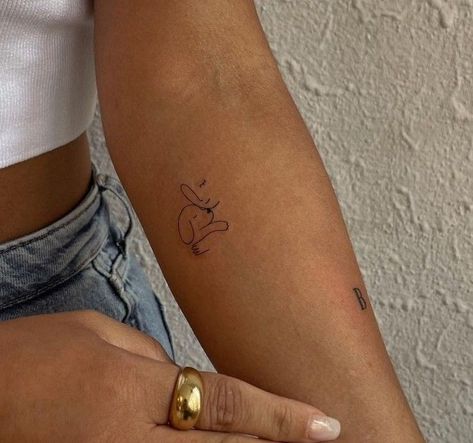 Cute Dog Tattoos For Women, Symbolic Dog Tattoo, Tattoo Ideas Dog Lovers, Dainty Dog Tattoo Simple, Small Animal Tattoos For Women Simple, Tattoos For Dog Moms, Dog Best Friend Tattoo, Tattoo For Dog Lovers, Dog Lover Tattoo For Women