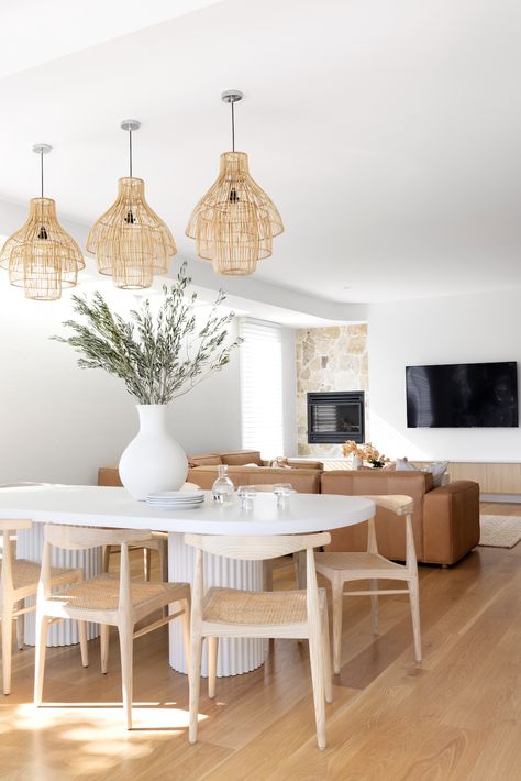 Dining room with 3 statement pendant lights | Scandi-Med home tour Space Photoshoot, Mediterranean Holiday, Grey Wall Tiles, Coastal Dining, Modern Mediterranean, Brisbane City, Holiday Vibes, White Laminate, White Living