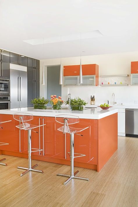 Orange; It’s a hotly debated color – you either love it or hate it. Whatever camp you’re in, these kitchens will make you smile. | colorful kitchens | kitchen decor ideas Orange And White Kitchen, Burnt Orange Kitchen, Orange Cabinets, Orange Kitchen Decor, Серая Кухня, Kitchen Design Color, Kabinet Dapur, Orange Kitchen, Orange Decor