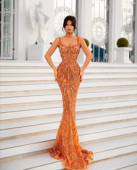 Fully embroidered orange mermaid dress with heart shaped neckline and spaghetti straps. Burnt Orange Prom Dress, Orange Mermaid, Orange Gown, Orange Prom Dresses, Dresses Birthday, Prom Dress Inspo, Prom Outfit, Orange Midi Dress, Dream Prom