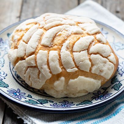 Conchas Mexican Sweet Bread Mexican Sweet Bread, Mexican Sweet Breads, Sweet Bread, Evaporated Milk, Mexican Dishes, Baking Sheets, Ground Cinnamon, Corn Starch, Purpose Flour