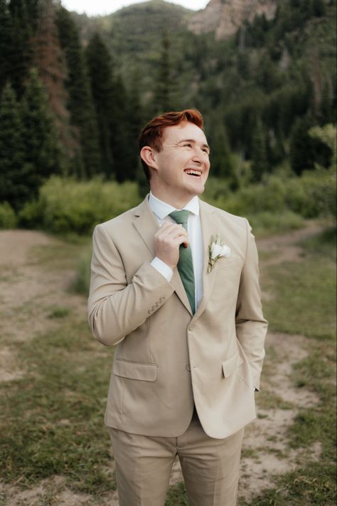 Sage And Tan Groomsmen, Groom With Tan Suit, Tan Suit With Green Bow Tie, Beige Suit With Sage Green Tie, Tan Suit With Sage Green Tie, Beige Suit Green Tie, Tan Suit With Green Tie, Tan Suit Groom, Tan Groomsmen