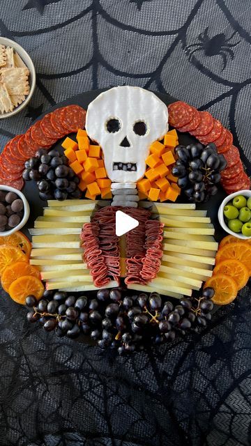 Ain’t Too Proud To Meg on Instagram: "SAVE this post & follow @ainttooproudtomeg for more. Comment CHEESE & I’ll DM you the full instructions to this CHARCUTERIE SKELETON so you can have it ready for #halloween.     INGREDIENTS  * 13 oz brie  * 2 oz blueberry jam  * 4 yogurt covered pretzels  * string cheese * 16 oz young manchego, sliced evenly lengthwise & height wise into triangles * 12 oz @columbusmeats Italian Dry Salame  * @columbusmeats Charcuterie Tasting Board (I used the Calabrese Salame, Castelvetrano olives & chocolate covered cranberries from here) * 10 oz mild cheddar, cubed  * 30 oz dark purple grapes  * 8 dried orange slices     INSTRUCTIONS  1. Place brie in the freezer for 15-20 minutes to allow for easier cutting.  2. For the brie skull, cut wedges out of the sides of th Brie Skull Charcuterie, Skull Brie Cheese, Skeleton Brie Cheese, Charcuterie Skeleton, Spooky Charcuterie Board, Halloween Charcuterie Board Ideas, Tasting Board, Castelvetrano Olives, Halloween Finger Foods