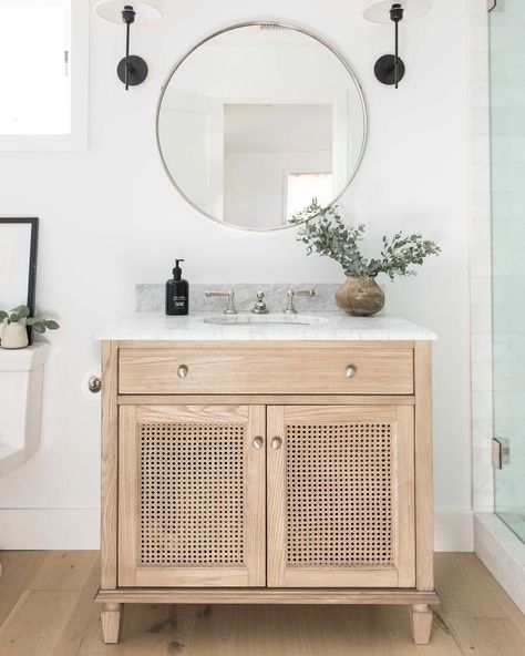 @puresalt posted to Instagram: When you have an adorable cane vanity as the foundation for the bathroom, only minimal styling is needed to really let the materials shine! #flowerstreetproject // 📷: @vlentine #mypuresalthome #puresalt #puresaltinteriors #ruemagazine #homewithrue #ruedaily #modernluxury #modernluxurydesign #modernluxdesign #luxemagazine #dwellmagazine #howwedwell #inmydomaine #makehomematter #prettylittleinteriors #bhghome #showmeyourstyled #howihaven #bathroominspiration # Small Bathroom Solutions, Pure Salt Interiors, Bathroom Vanity Designs, Pure Salt, Best Bathroom Designs, Relaxing Space, Small Bathroom Vanities, Bathroom Solutions, Vanity Design