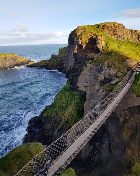 Ireland • Passion • Travel on Instagram: “▪ The Carrick-a-Rede Rope Bridge is a rope bridge near Ballintoy in County Antrim, Northern Ireland. The bridge links the mainland to the…” Ireland Photos, Rope Bridge, The Bridge, Northern Ireland, Bridge, Photo And Video, Water, Travel, Instagram