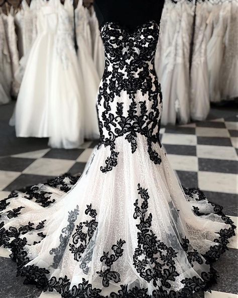 Find unique black lace wedding dresses #MaggieSottero #wedding #weddingdress #weddinggown #weddinginspo #weddinginspiration #uniqueweddingdress #blackweddingdress #coloredweddingdress #laceweddingdress #mermaidweddingdress #straplessweddingdress Black And Wedding Dress, Black And White Wedding Dress Mermaid, Black And White Mermaid Dress, White Wedding Dress Black Lace, Black And White Lace Wedding Dress, Wedding Dresses With Black Accents, Black And White Wedding Dress With Sleeves, White Wedding Dress With Black Lace, Wedding Dress With Black Accents