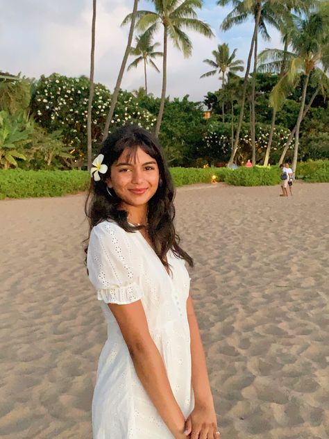 white dress with a white flower in my hair on a beach in maui White Dress Beach Photoshoot, Tropical Pics, White Beach Dress Summer, Flower Dresses Outfit, Beach 2024, Face Pose, Beach Photo Inspiration, Beach In Hawaii, Beach White Dress