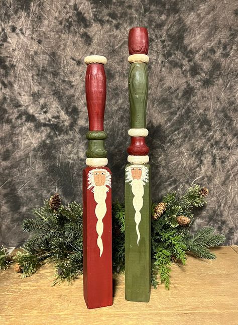 Primitive wooden spindle Santa Claus! Set of 2 hand painted Santas on antique wooden spindles! One of a kind Christmas decor! Perfect for mantles!  Size: 15 x 1.5 in; 17 x 1.5 in Spindle Snowmen, Painted Santas, Christmas Sled Decoration, Santa Christmas Decor, Primitive Christmas Crafts, Santa Claus Crafts, Spindle Crafts, Stair Spindles, Santa Paintings