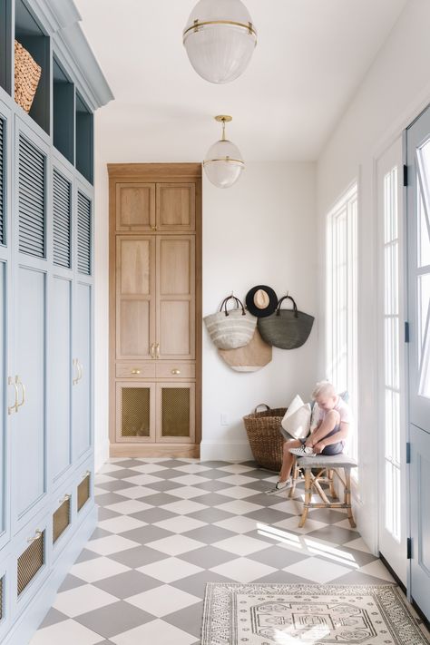 How beautiful is this mudroom? We love the gray and white checkered floor tile paired with the light blue mudroom cubbies! Metal grated front cabinets + mudroom storage ideas + dutch door into mudroom | Tiek Design Group Checkered Floor, Mudroom Flooring, Mudroom Design, My Love Language, Blue Cabinets, Design A Space, Mud Room, White Tiles, Colonial House