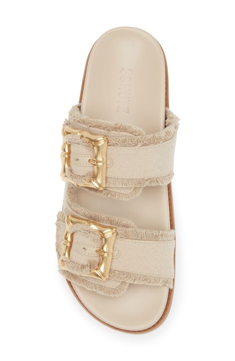 Bamboo-inspired buckles and frayed trims bring visual intrigue to a slide sandal set on a contoured footbed for a customized fit. Textile upper/synthetic lining and sole Made in Brazil Trendy Beige Slide Sandals, Designer Summer Slides With Tang Buckle, Designer Summer Slides With Buckle Closure, Beige Slides With Buckle Closure For Beach, Beige Textured Slide Sandals, Palm Springs Outfit, Plastic Sandals, Pearl Oyster, White Platform Sandals