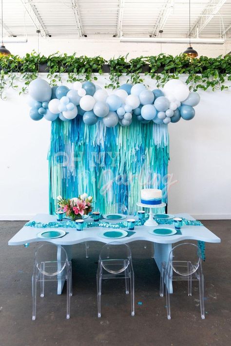 Ready to make a splash? Transform any room into an ocean wonderland with this Big ONE Backdrop! It's the perfect way to capture the waves of your ocean theme birthday party. Guests won't be able to contain their excitement when they see this immersive party decor! (Bonus: no lifeguards necessary.) Transform any event into an extraordinary experience with our dazzling handmade plastic fringe backdrops. Whether it's a birthday bash, a chic bridal shower, or a glitzy gala, our backdrops will elevat Ocean Theme Birthday Party, Backdrop Streamers, Tassel Backdrop, Streamers Party, Party Fringe, Streamer Wall, Fringe Decor, Surf Birthday, Ocean Theme Birthday