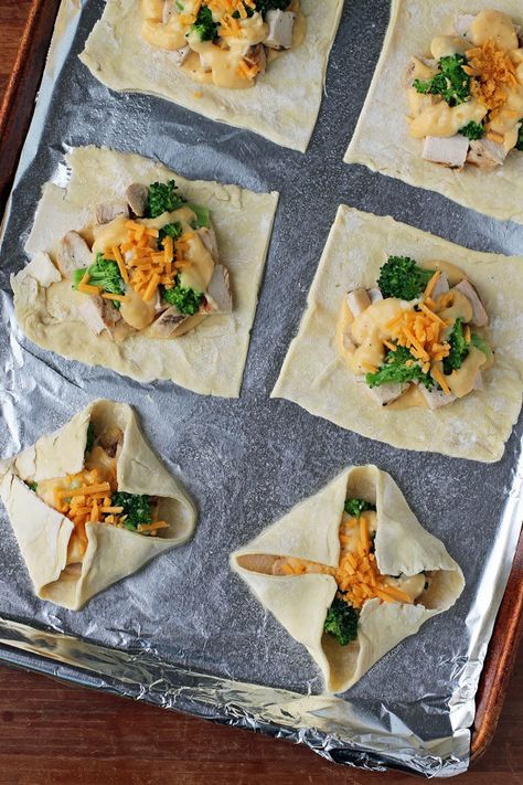 These Cheesy Chicken and Broccoli Pastry Bundles are perfect comfort food with a creamy cheese sauce and flaky pastry! Just 266 calories or 8 WW Freestyle SmartPoints each. www.emilybites.com Chicken Broccoli Cheese Puff Pastry, Broccoli Puff Pastry, Crescent Roll Recipes Chicken Broccoli, Toddler Broccoli Bites, Broccoli Cheese Bites Toddler, Puff Pastry Ingredients, Puff Pastry Chicken, Chicken Broccoli Cheese, Recipes Using Rotisserie Chicken