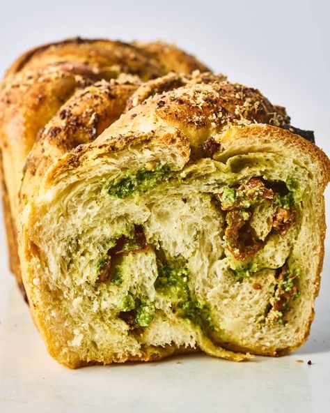 Recipe: Savory Babka with Pesto, Ricotta, and Sun-Dried Tomato. This Babka recipe tosses out the traditional chocolate swirl and replaces it with savory pesto, ricotta and sun-dried tomato for a delicious twist on the classic. Savory Babka, Pesto Ricotta, Babka Bread, Pesto Cheese, Babka Recipe, Chocolate Babka, Food Memes, Chocolate Swirl, Challah