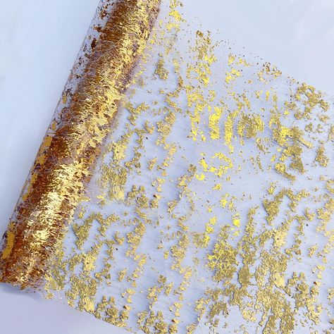 PRICES MAY VARY. Polyester Mesh MULTIPLE SIZE OPTIONS: What you will get: 1 piece 49ft（590inch）gold table runner. Which can be cut into 120inch/72inch/108inch/90inch/160inch table runners.We also have a variety of sizes for you to choose from, you can choose the appropriate length according to your needs. PREMIUM MATERIALS & GLAMINATING DESIGN: Our unique gold party decor is made of premium polyester mesh infused with sparkling gold foil for a dazzling look. Durable polyester material combined with gold foil, the openwork mesh pattern adds an air of elegance and sophistication to any table setting. MULTIPURPOSE TABLE RUNNER: Measuring 11 inches in width, our glittering gold table runner extends up to 590 inches in length, making it suitable for round, square, or rectangular tables. Its ver Green And Gold Decorations, Gold Theme Party Decorations, Table Decorations For Party, Gold Table Decorations, Gold Table Runner, Gold Table Decor, Black And Gold Party Decorations, Gold Runner, Gold Centerpiece