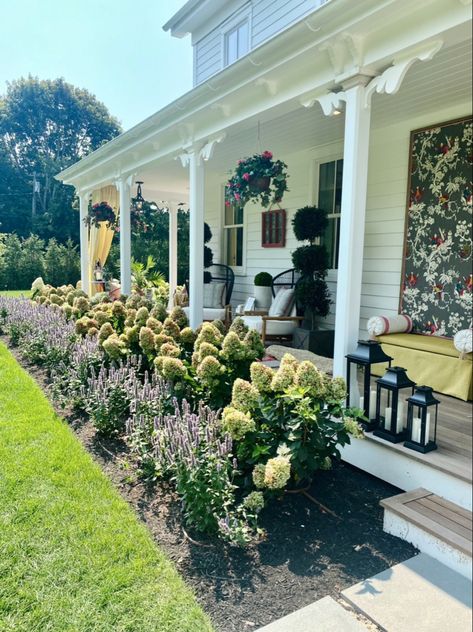 porch ideas porch aesthetic summer house ideas porch ideas How To Landscape Front Of House, Hydrangea Landscaping Colonial House, Southern Landscaping Ideas Front Yard, Front Porch Hydrangea Landscaping, Hydrangea Landscaping Ranch House, White Hydrangea Front Porch, Hydrangeas In Front Of House Porches, French Country Flower Beds, East Coast Landscaping Ideas